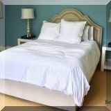 F34. Queen bed with upholstered headboard. 60”h 